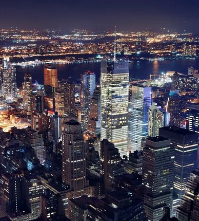City skyline at night across the water